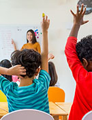 Students raising hands